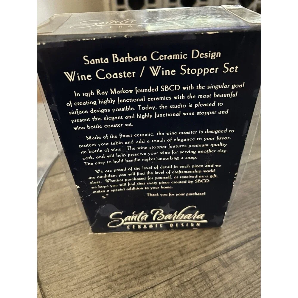 Santa Barbara Ceramic Design Wine Coaster/Wine Stopper Set New In Box